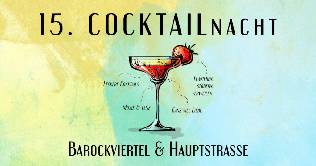 Ein Cocktailglas mit Erdbeere am Rand